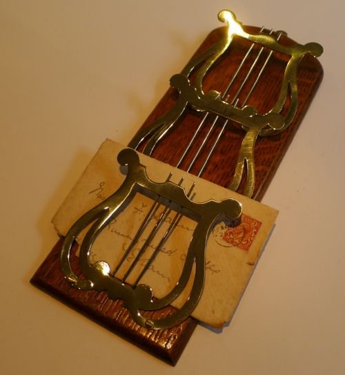 antique english oak and brass letter rack holder lyre design