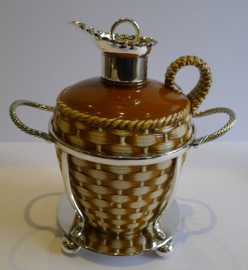 antique english stoneware whiskey decanter by taylor tunnicliffe co in silver plated caddy c1888