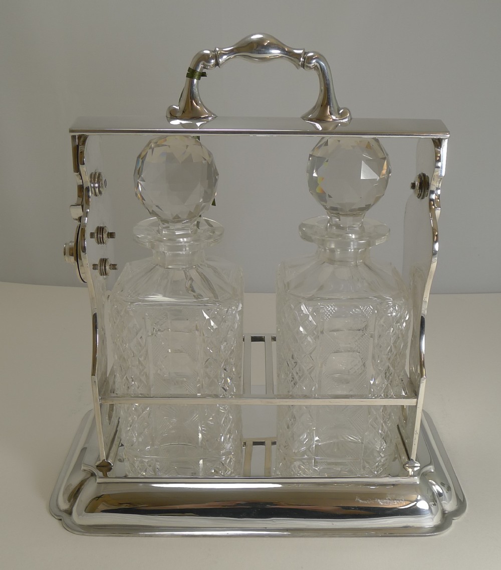 outstanding two bottle tantalus lockable liquor frame by john grinsell sons