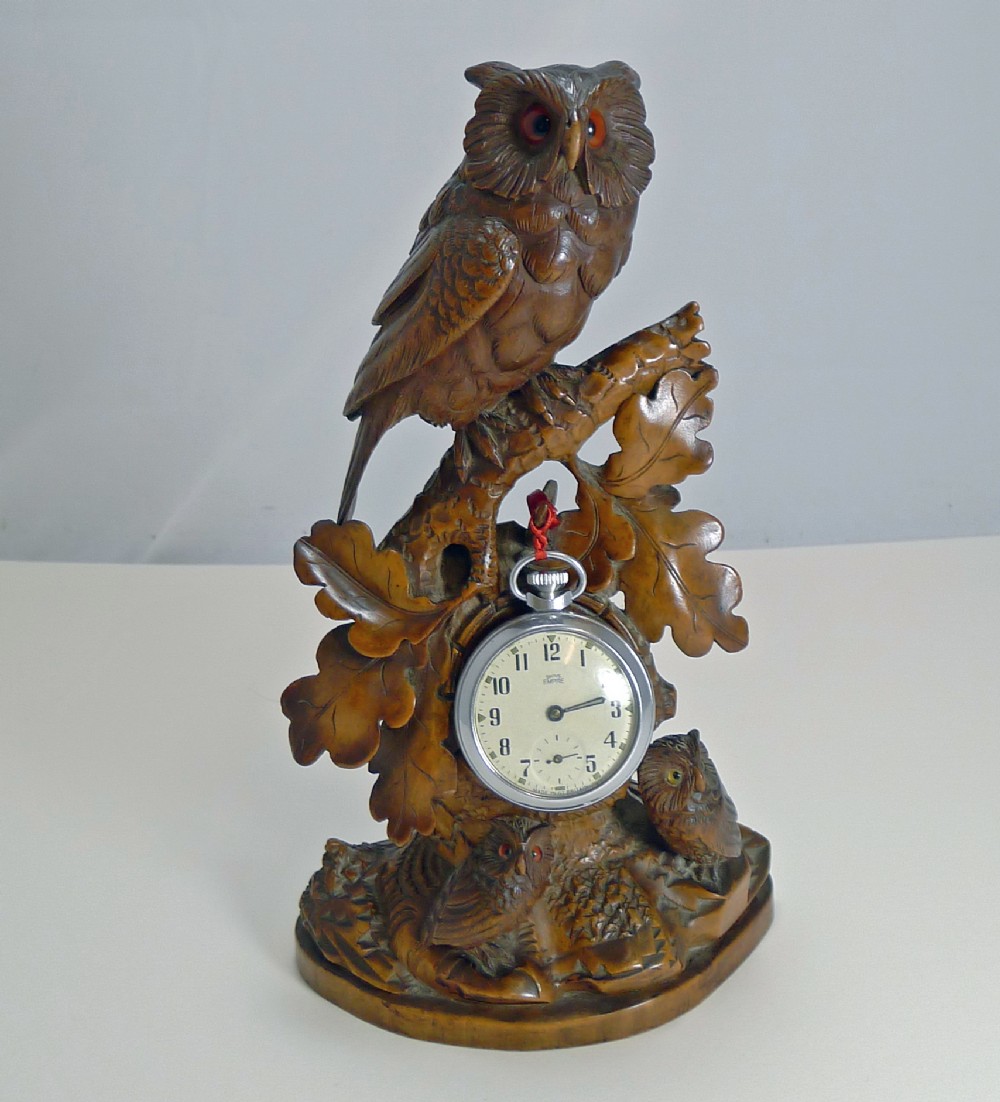 magnificent figural black forest pocket watch stand owl family c1900