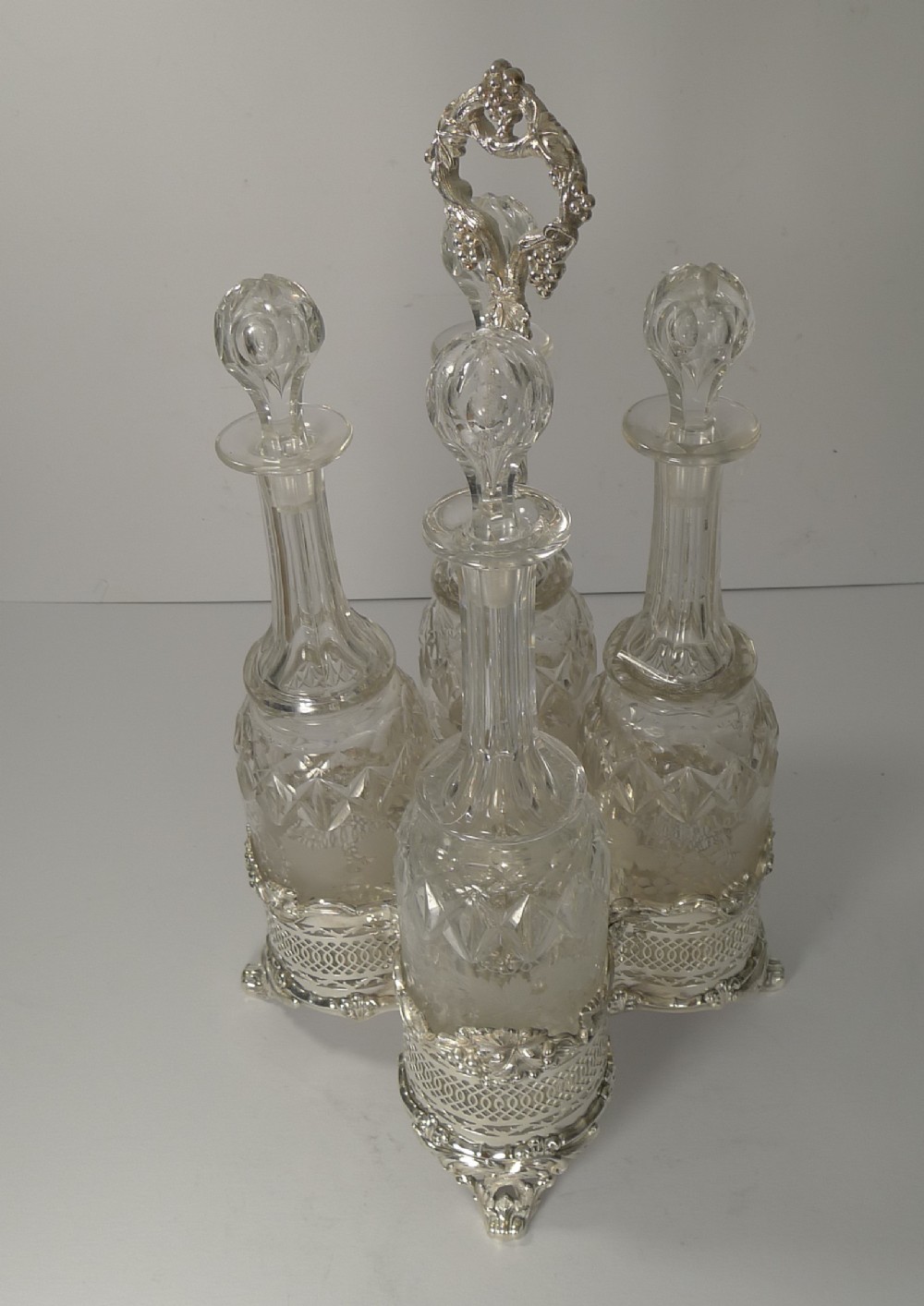 four antique english wine decanters in stand c1890