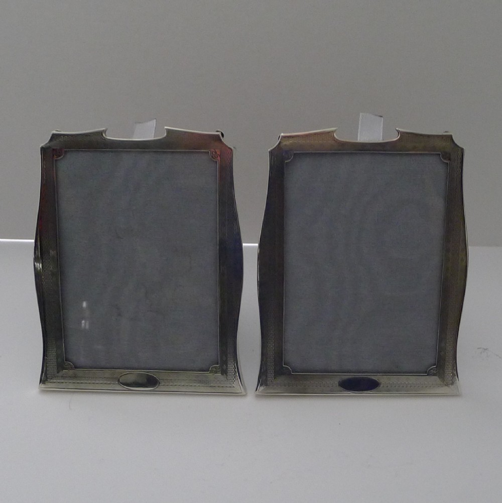 pair small art deco engineturned silver picture frames