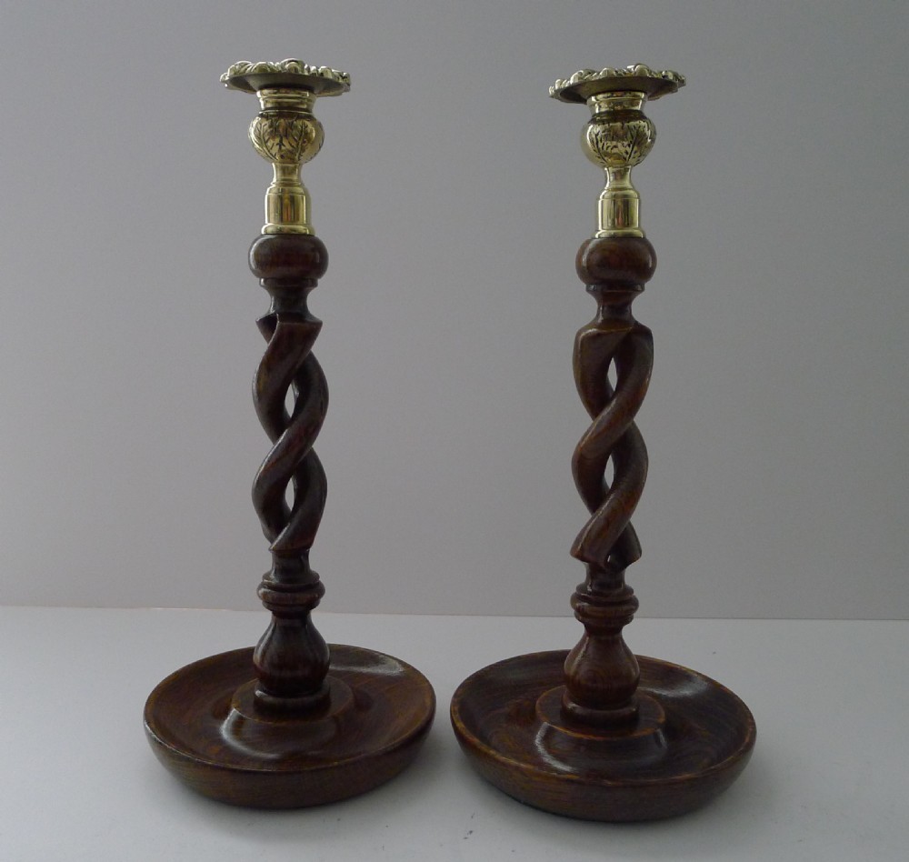 pair antique english oak barley twist candlesticks brass tops