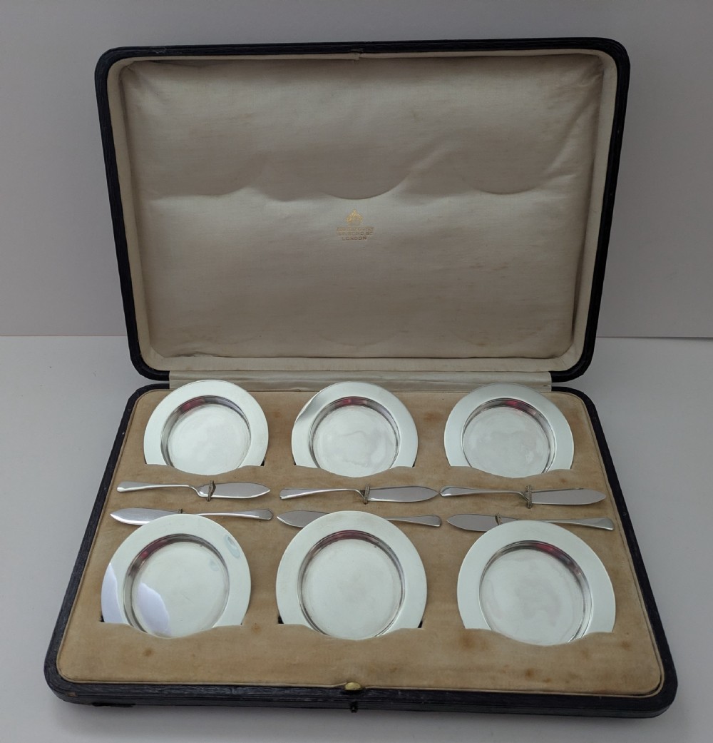asprey co set six sterling silver butter dishes and knives 1909