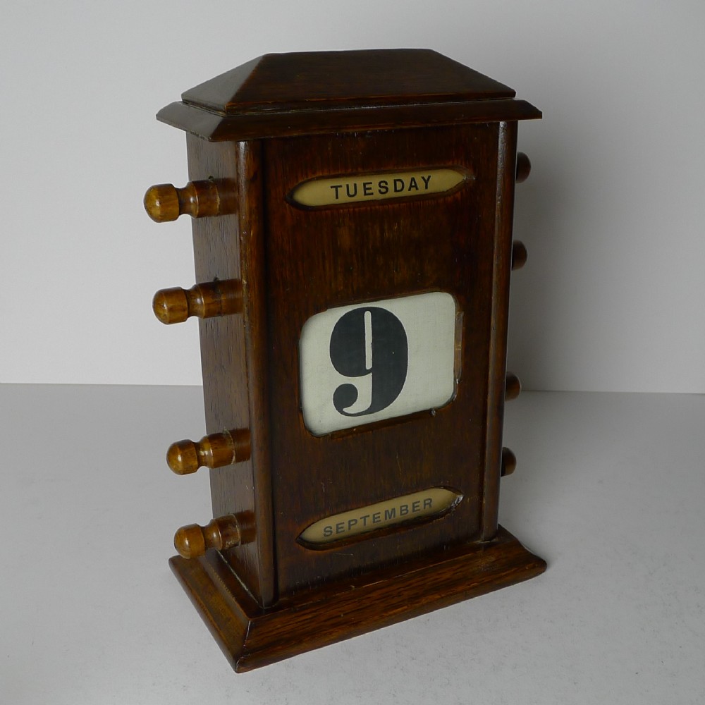 antique english oak perpetual calendar c1910